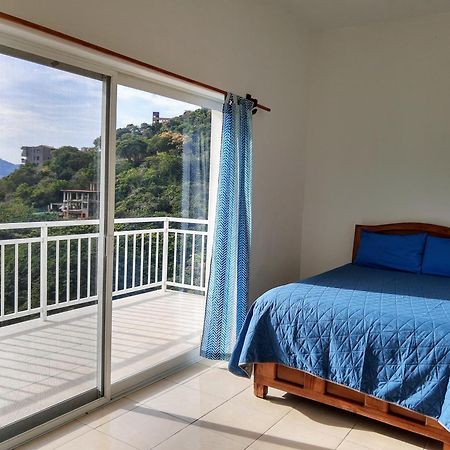 Aparthotel Sunset House Zihuatanejo Chambre photo