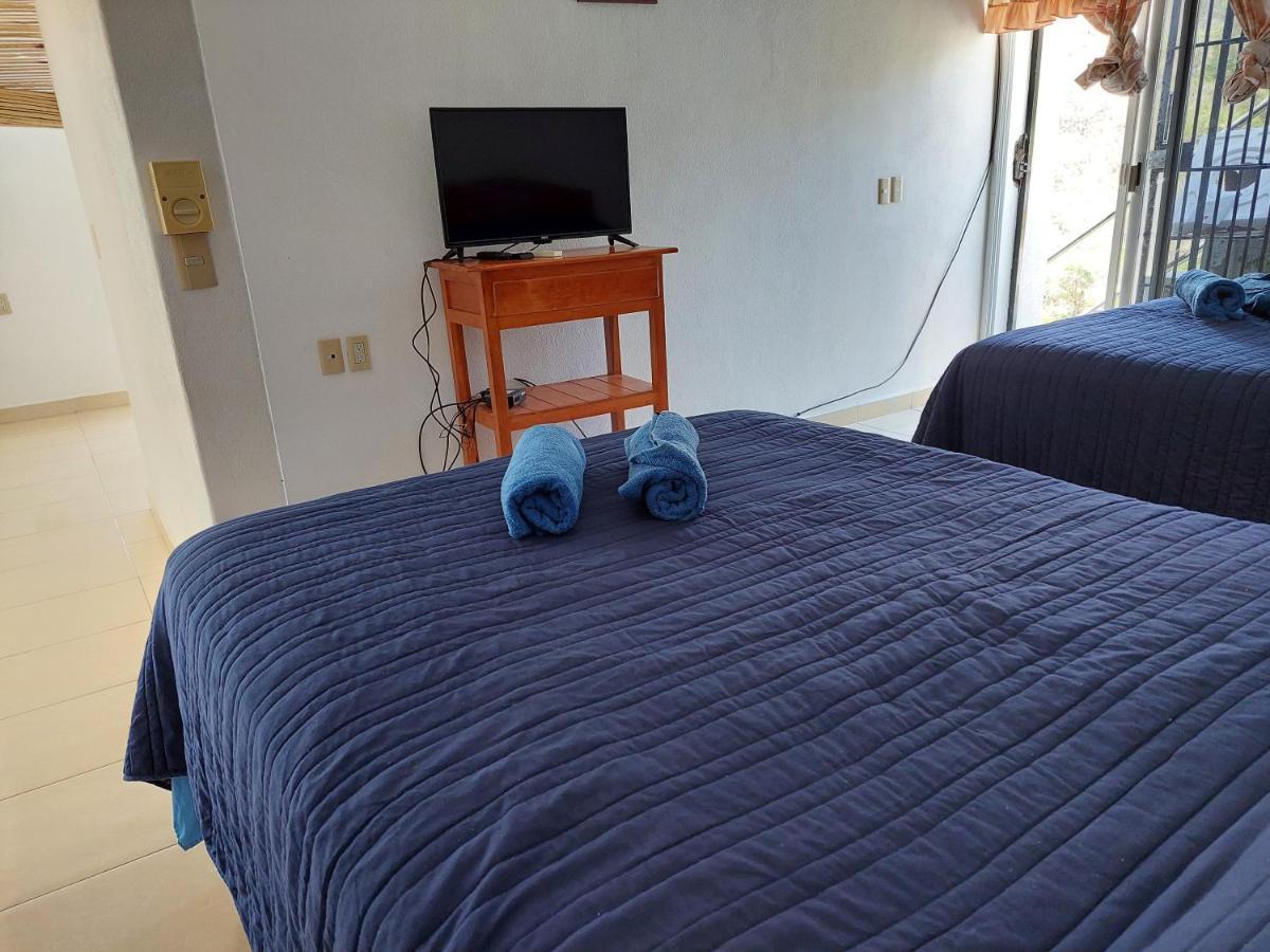 Aparthotel Sunset House Zihuatanejo Extérieur photo