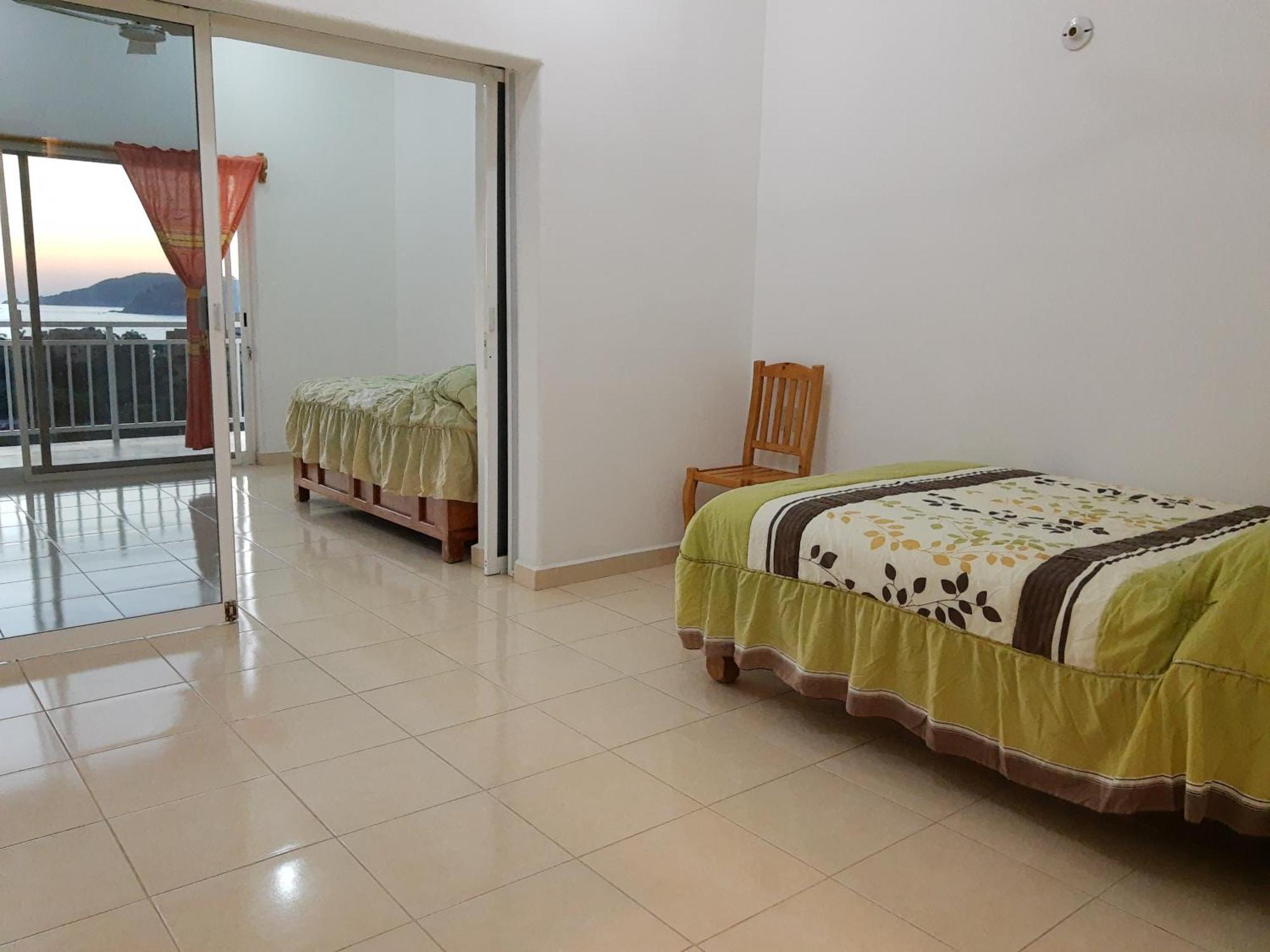 Aparthotel Sunset House Zihuatanejo Chambre photo